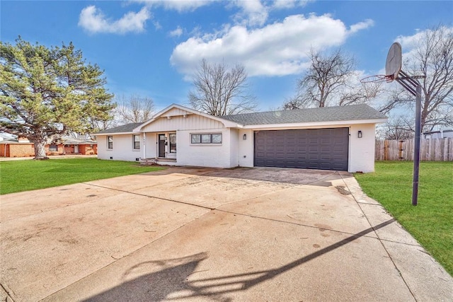 ranch-style home featuring a garage and a front yard