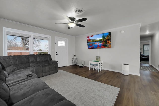 living room featuring ornamental molding, dark hardwood / wood-style floors, and ceiling fan