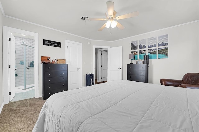 carpeted bedroom featuring crown molding, ceiling fan, and ensuite bath