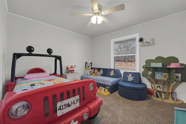 bedroom with crown molding, carpet flooring, and ceiling fan