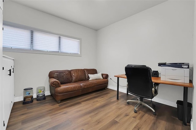 office area with wood-type flooring