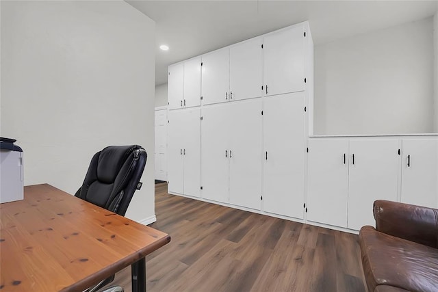 home office featuring hardwood / wood-style floors