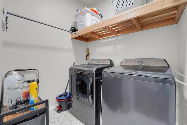 laundry room with separate washer and dryer