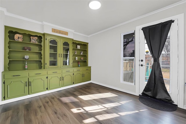 interior space with crown molding and dark hardwood / wood-style floors