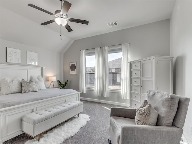 bedroom with ceiling fan, carpet flooring, and vaulted ceiling