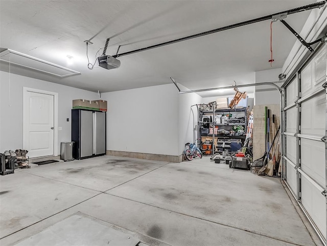 garage featuring a garage door opener