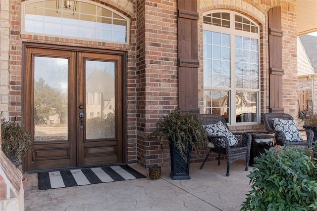 property entrance featuring french doors