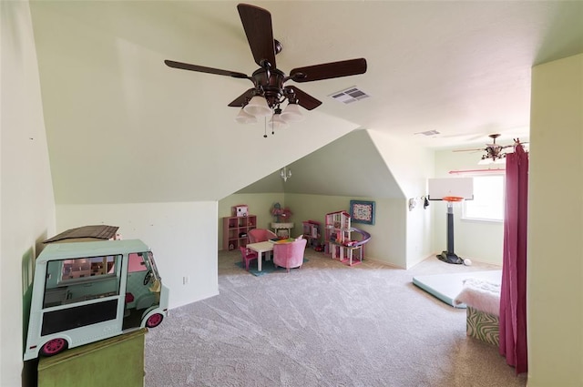 game room featuring ceiling fan, vaulted ceiling, and light carpet