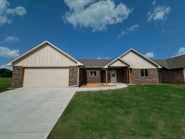 210 S Noble Ave, Hinton, OK 73047 - single story home featuring brick siding, a front lawn, a garage, concrete driveway, and board and batten siding