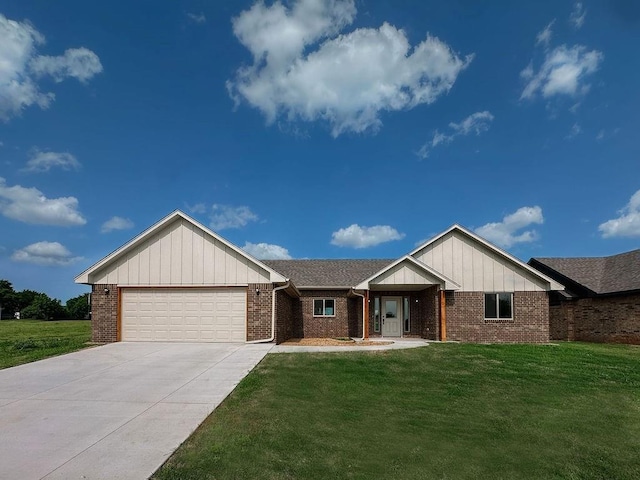 210 S Noble Ave, Hinton, OK 73047 - single story home featuring brick siding, a garage, a front yard, and driveway