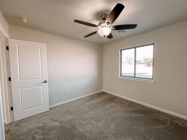 210 S Noble Ave, Hinton, OK 73047 - carpeted spare room with a ceiling fan, a smoke detector, and baseboards