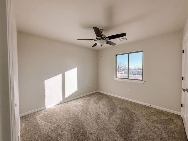 210 S Noble Ave, Hinton, OK 73047 - carpeted spare room featuring ceiling fan and baseboards