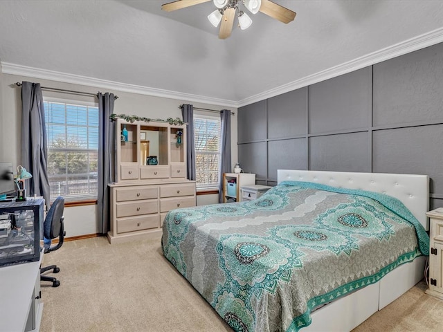 bedroom with a decorative wall, ornamental molding, light carpet, vaulted ceiling, and ceiling fan