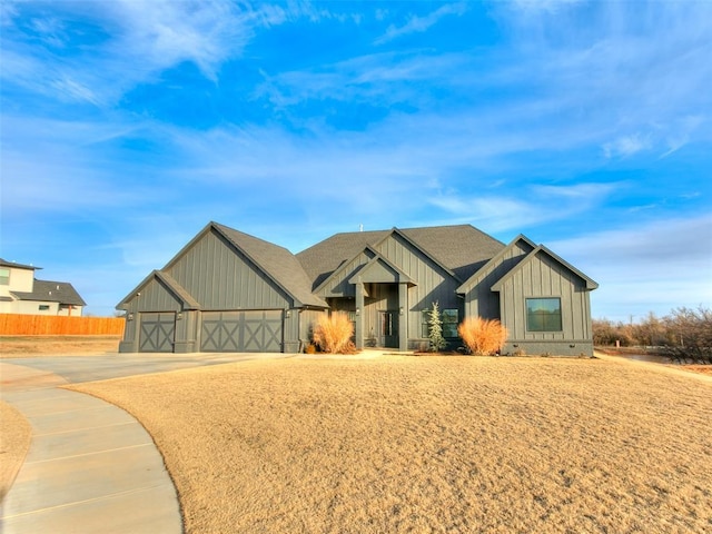 view of front of property with a garage