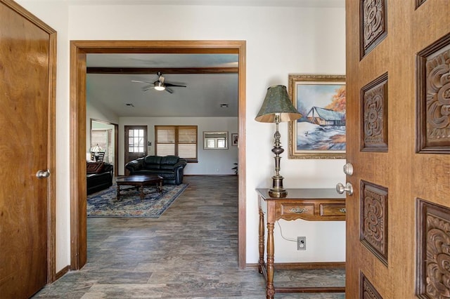 hall with vaulted ceiling with beams