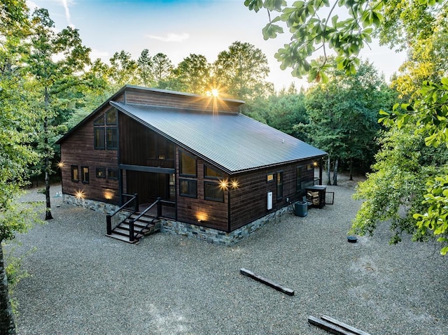 view of front of home with central air condition unit