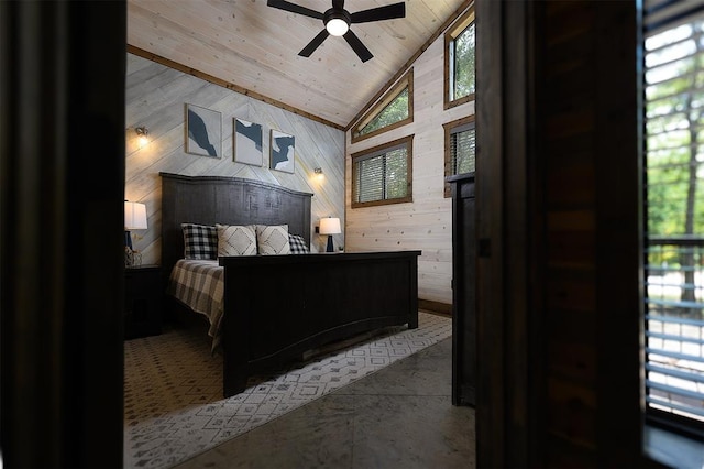 bedroom featuring wooden walls, wooden ceiling, ceiling fan, vaulted ceiling, and concrete flooring