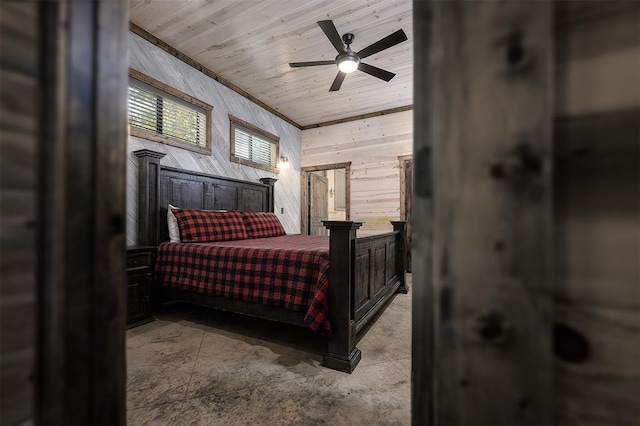 bedroom featuring wood ceiling, crown molding, wooden walls, and ceiling fan