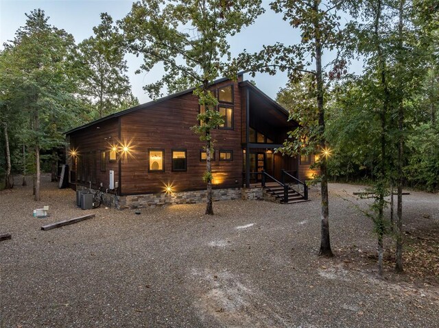 65 Rocky Rose Cir, Broken Bow, OK 74728 - view of side of property featuring central AC unit