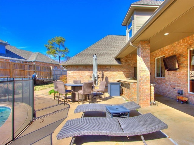 view of patio / terrace featuring exterior bar