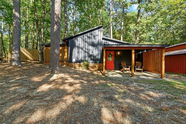 rear view of house featuring a patio area