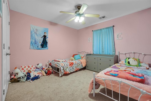 carpeted bedroom with ceiling fan