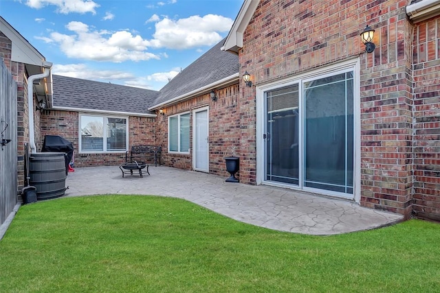 back of house featuring a patio and a lawn