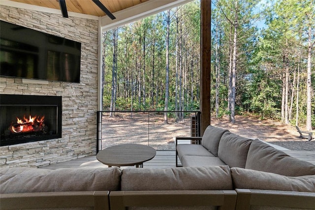 view of patio / terrace featuring an outdoor living space with a fireplace