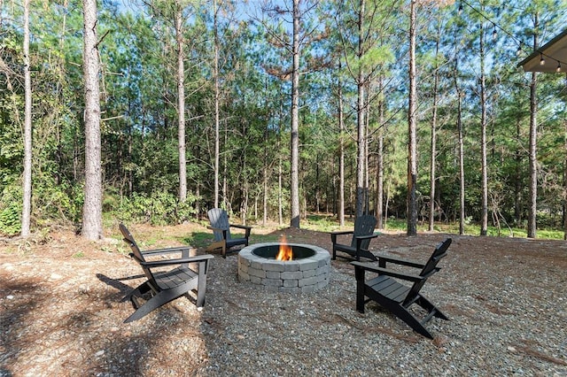 exterior space featuring an outdoor fire pit