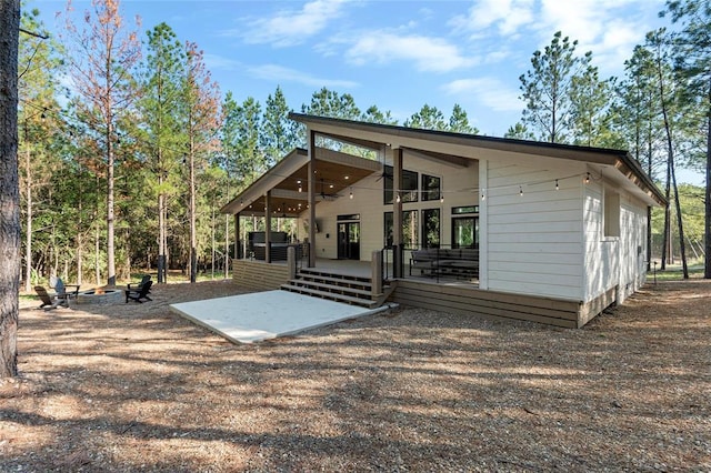 rear view of house featuring a patio area