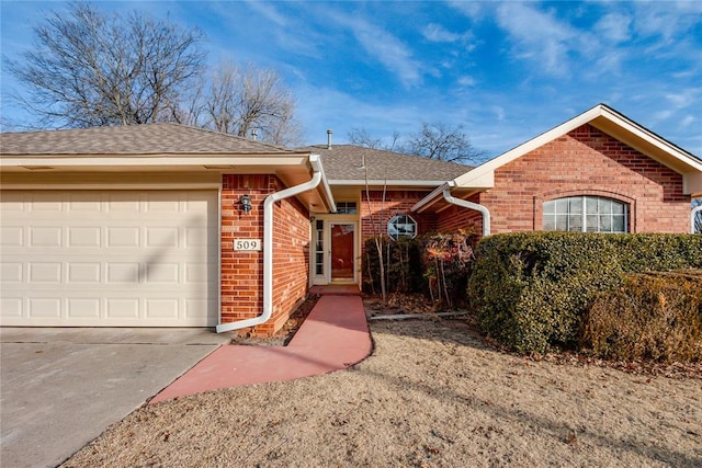 single story home with a garage