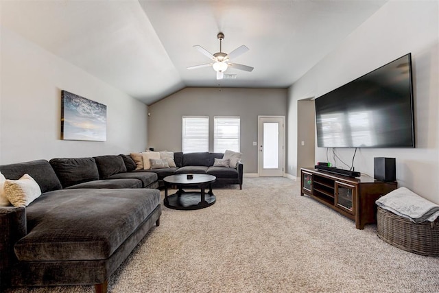 living room featuring light carpet, lofted ceiling, and ceiling fan