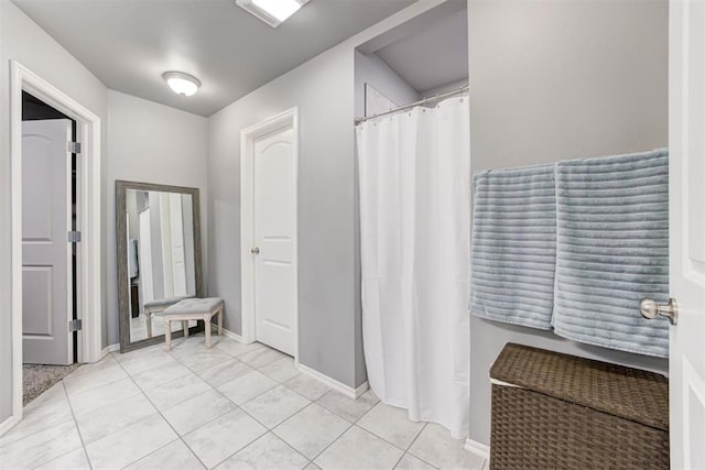 bathroom with tile patterned flooring