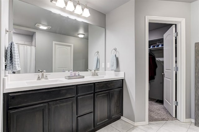 bathroom featuring vanity and tile patterned flooring