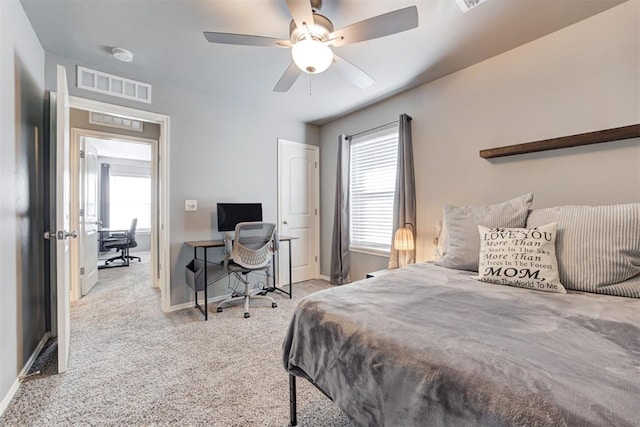 bedroom featuring ceiling fan and light colored carpet