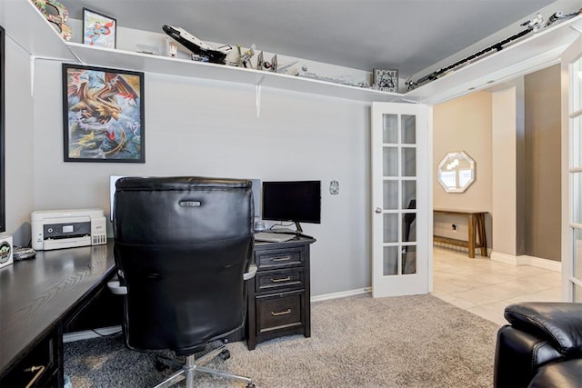 carpeted office featuring french doors