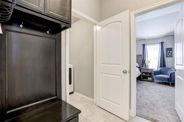 interior space featuring washer / clothes dryer and tile patterned floors