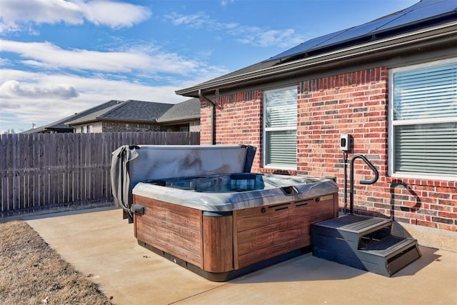 view of patio / terrace featuring a hot tub