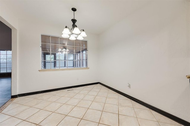 9718 Hummingbird Ln, Oklahoma City, OK 73162 - spare room with an inviting chandelier and light tile patterned flooring