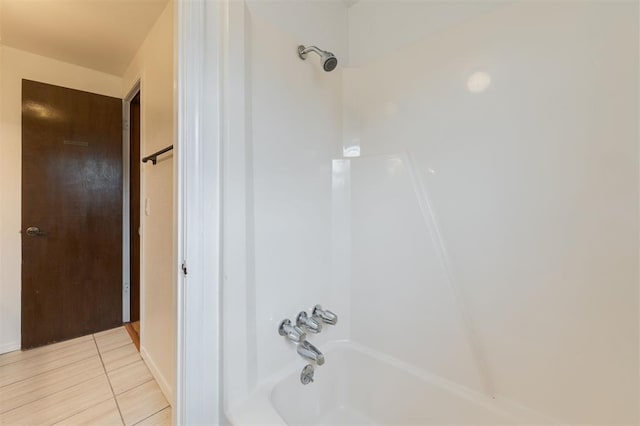9718 Hummingbird Ln, Oklahoma City, OK 73162 - bathroom featuring tile patterned floors and tub / shower combination