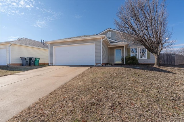 ranch-style house featuring a garage