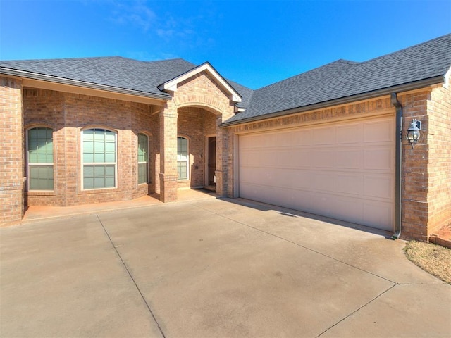 single story home with a garage