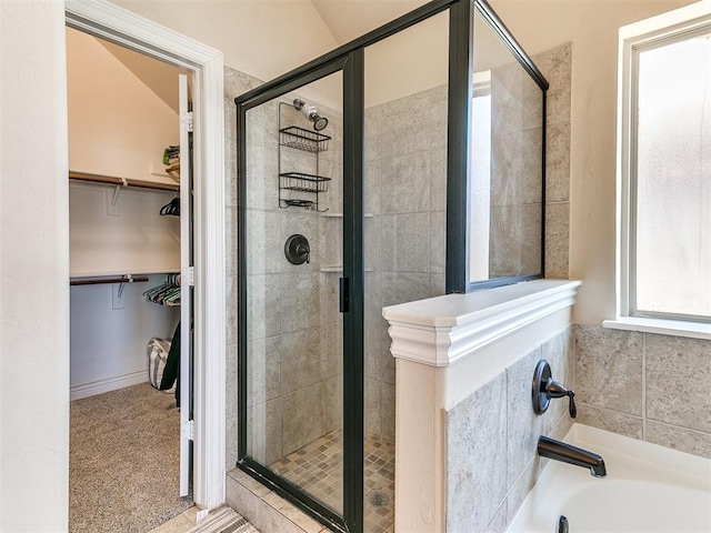 bathroom with plus walk in shower and vaulted ceiling