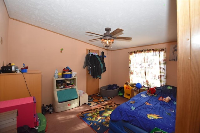 carpeted bedroom with crown molding, a textured ceiling, and ceiling fan