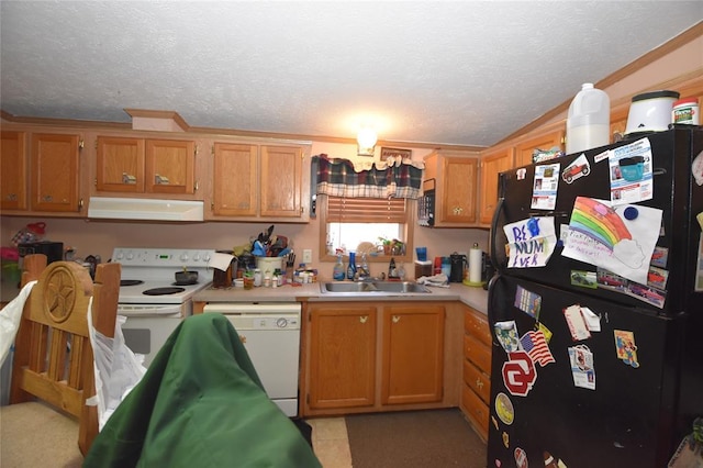 kitchen with white appliances, sink, and a textured ceiling