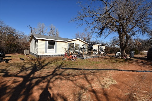 view of front of home with cooling unit