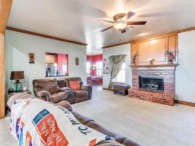 living room featuring light carpet, a brick fireplace, ornamental molding, and ceiling fan