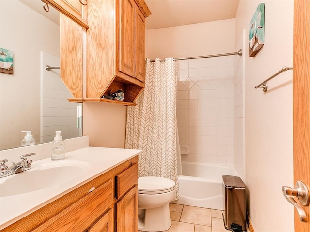 full bathroom with vanity, toilet, tile patterned flooring, and shower / bath combo with shower curtain