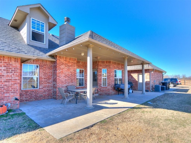 back of house featuring a patio and central AC unit