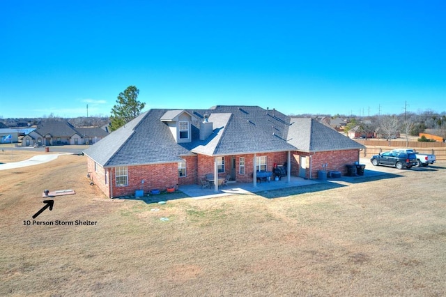 view of front of property with a patio area and a front yard